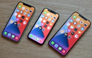 a group of i phones on a table