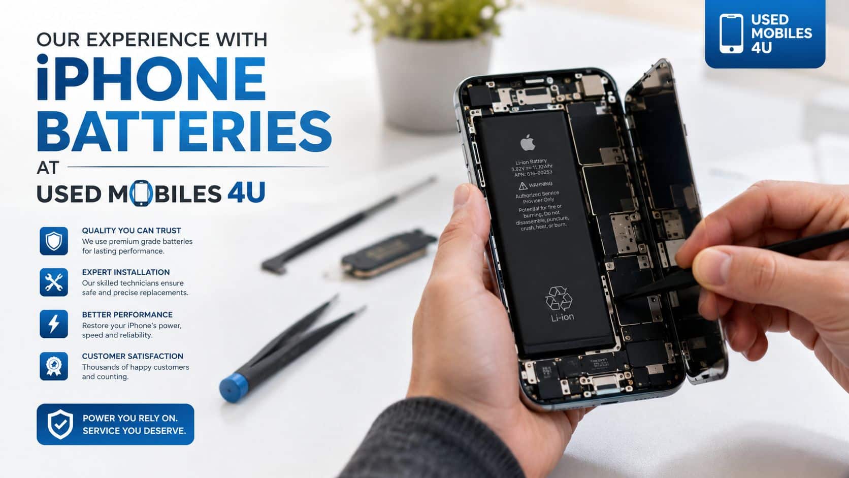 A technician carefully repairs an open iPhone, highlighting professional battery replacement services at Used Phones 4 U.